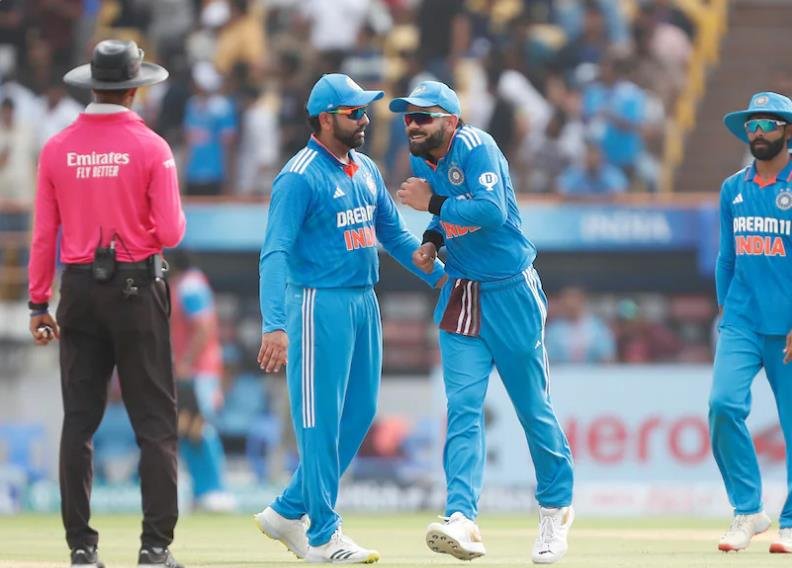 Rohit Sharma (left) and Virat Kohli (centre) and Ravindra Jadeja.