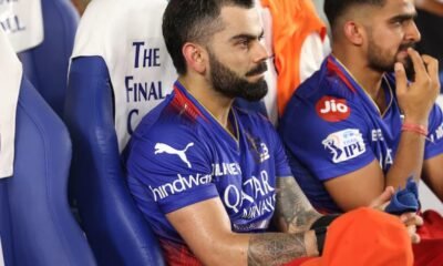 Virat Kohli sitting on RCB bench